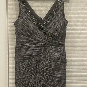 Gray women’s dress by Roy & Ali. Embellished front with gems.